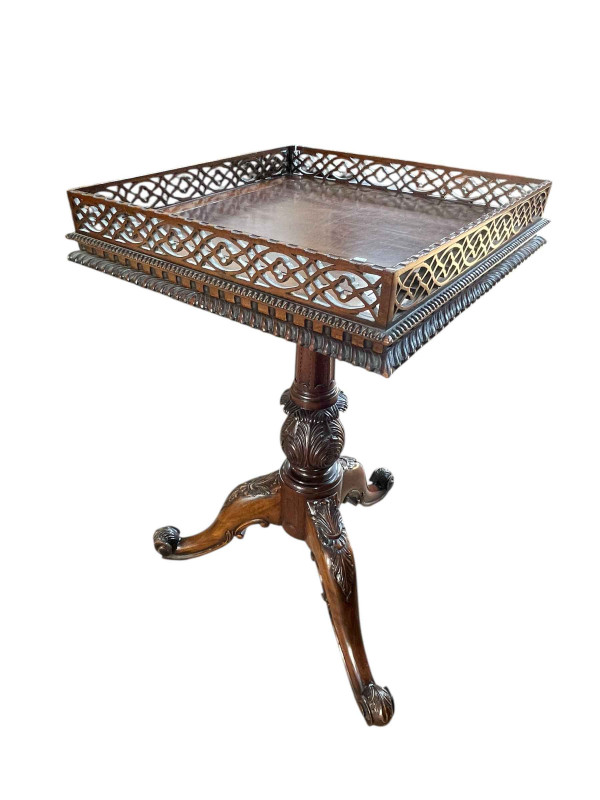 Chippendale style mahogany fretwork gallery topped wine table with slide on carved pedestal tripod base, 71cm by 43cm by 43cm.