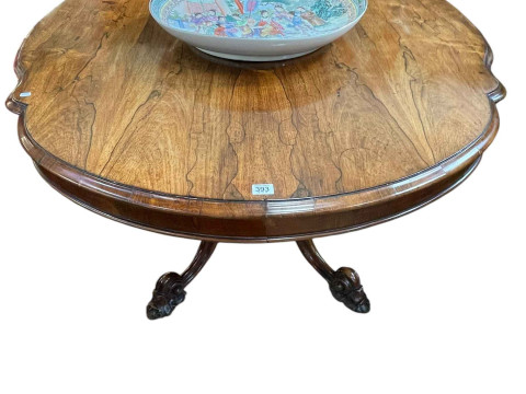 Victorian rosewood oval shaped top loo table on octagonal turned pedestal...