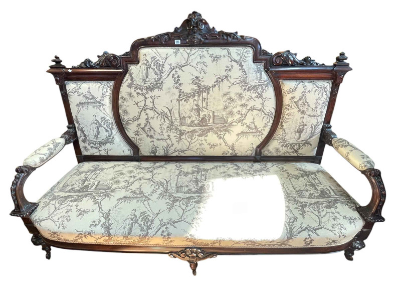 Victorian carved rosewood arched panel back open arm settee, 128cm by 186cm by 67cm.
