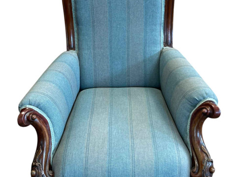 Victorian mahogany framed armchair on turned legs.
