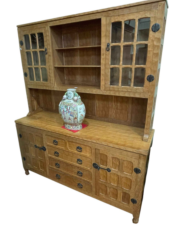 In the manner of Thompsons of Kilburn adzed Yorkshire oak glazed door top and shelf back dresser, 186cm by 153.5cm by 47cm.