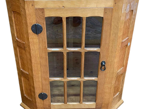 In the manner of Thompsons of Kilburn adzed Yorkshire oak glazed panel...