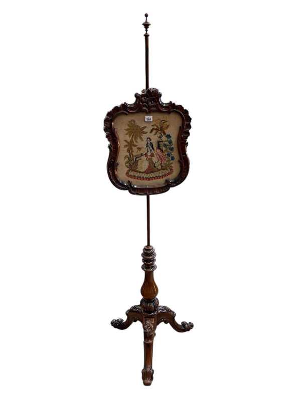 Victorian carved rosewood triform pole screen with glazed needlework panel, 171.5cm.