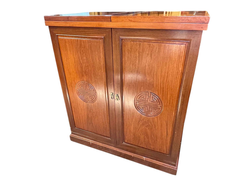 Oriental two door cocktail cabinet with double hinged top, 103.5cm by 91cm by 50.5cm.