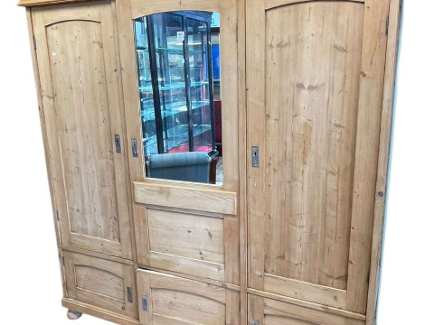Continental pine arched top wardrobe having three doors, one with mirror...