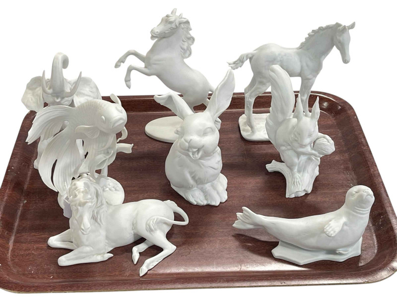 Collection of Kaiser Porcelain animals including two horses, unicorn, elephant, seal, rabbit, squirrel and fish.