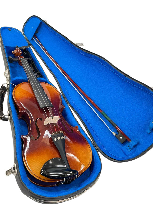 Violin in case with bow.