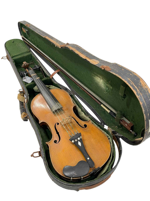 Violin in case with bow, marked Nicolaus Umati, dated 1886.