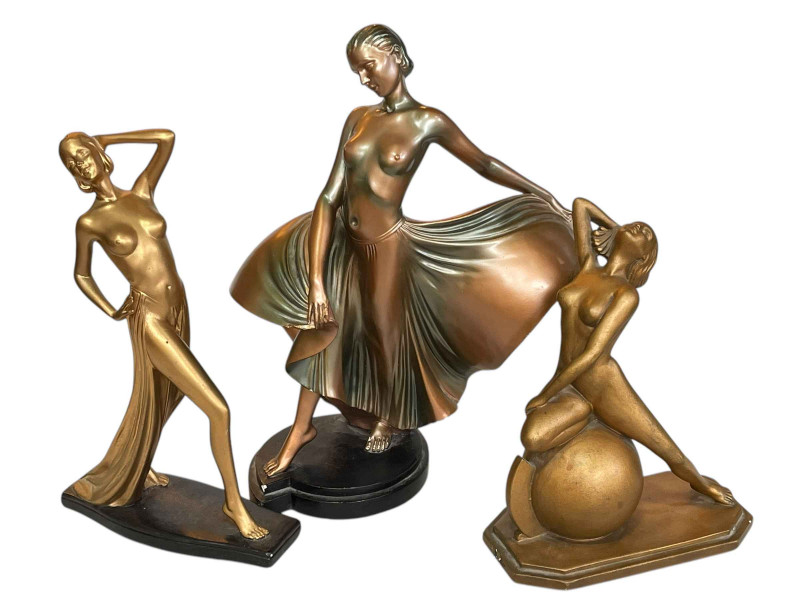 Three Art Deco style ladies in dancing poses.