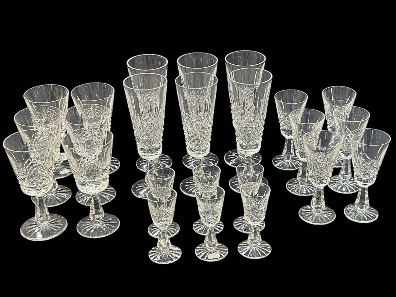 Four sets of six Waterford Crystal 'Kenmore' glasses including champagne, port wine, sherry and liqueur.
