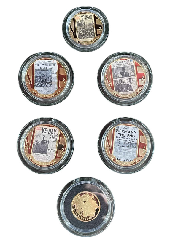 The VE Day Chronicle 75th Anniversary coin set, comprising 'The Fallen' 9ct two crowns gold collection coin (8g) and five layered in pure 24ct gold commemorative coins. With certificates.