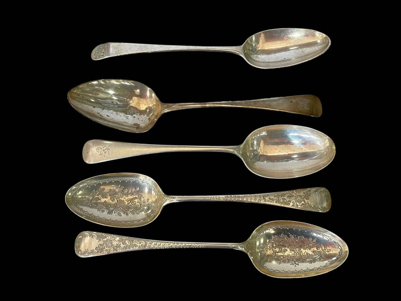 Pair Edwardian silver serving spoons with chased decoration, Birmingham 1903, two Georgian tablespoons, and one other (5).