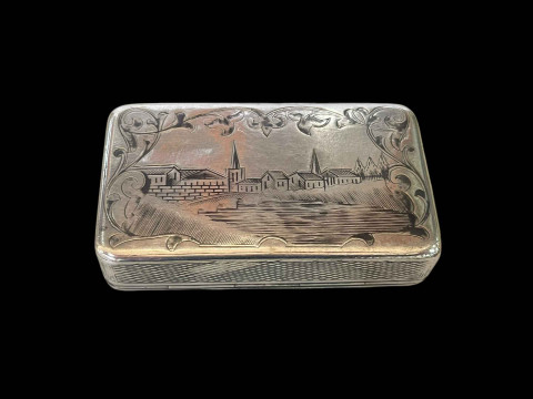 Russian niello silver snuff box, the lid and base with town scenes, dated 1860, 7.5cm across. thumbnail
