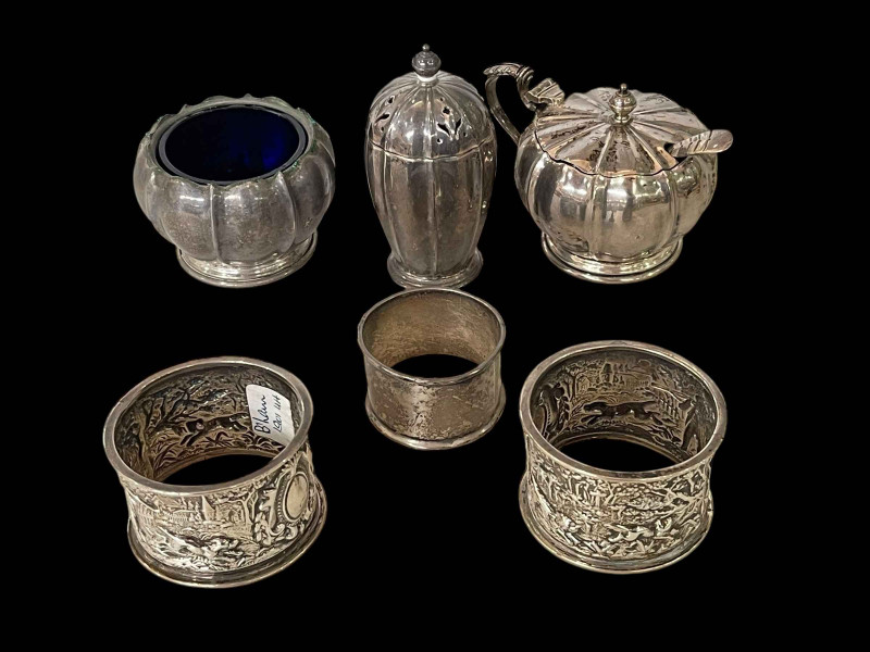 Silver cruet set, Birmingham 1959, pair ornate silver napkin rings, Birmingham 1901, and other napkin ring.