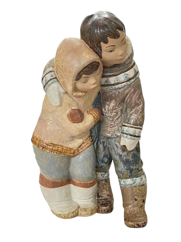Lladro group 'Eskimo boy and girl' printed backstamp verso, 39cm.