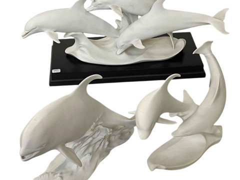 Three Kaiser Dolphin and Whale figures including two limited edition.