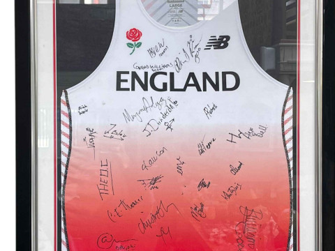 England Athletics competition vest signed by the full squad who competed...