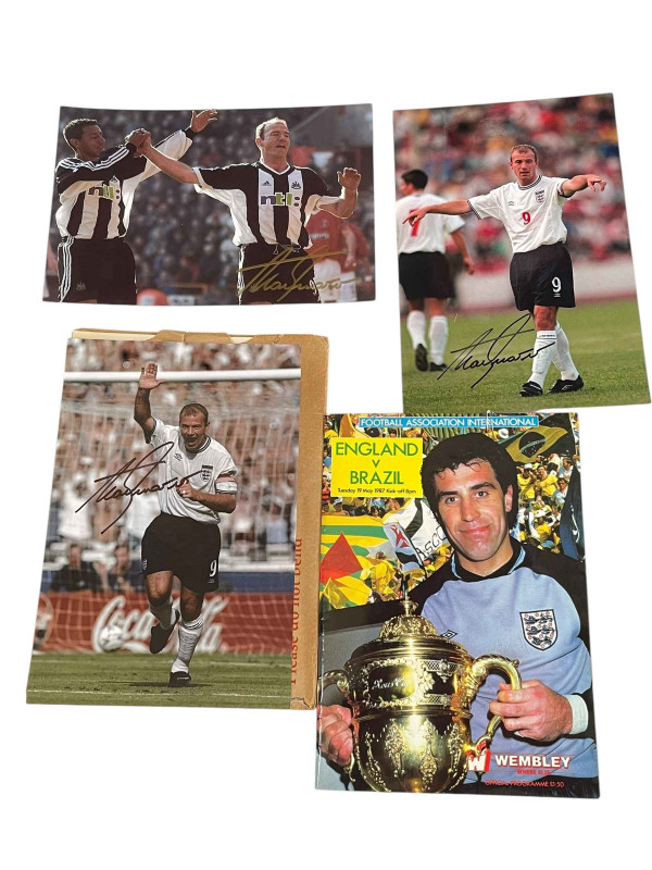 Framed Newcastle United football team shirt. Together with Alan Shearer No. 9, re printed photographs and a signed Bobby Robson 'England v Brazil' 1987 programme with ticket stub.