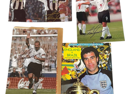 Framed Newcastle United football team shirt. Together with Alan Shearer No. 9, re printed photographs and a signed Bobby Robson 'England v Brazil' 1987 programme with ticket stub. thumbnail