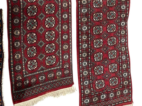 Two similar Pakistani hand knotted wool runners, longest 2.45 by 0.79.