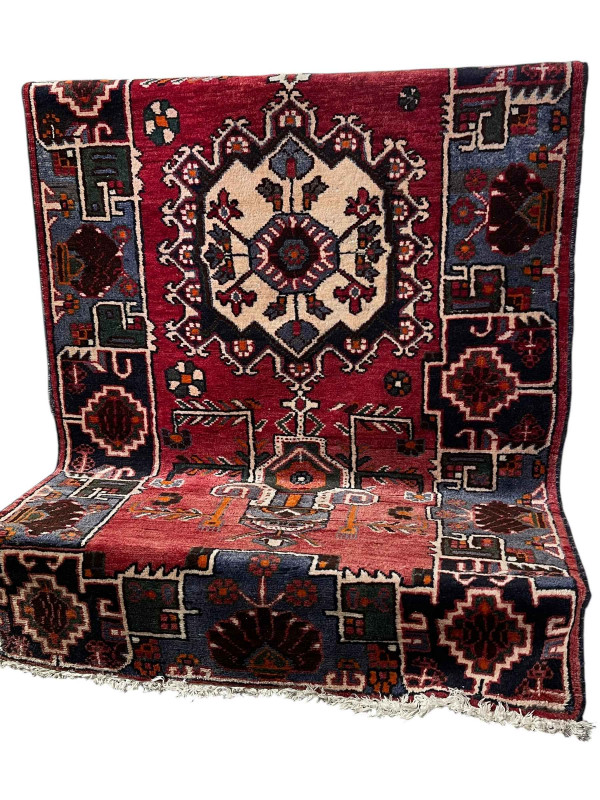 Persian design wool rug with central medallion 2.70 by 1.28.
