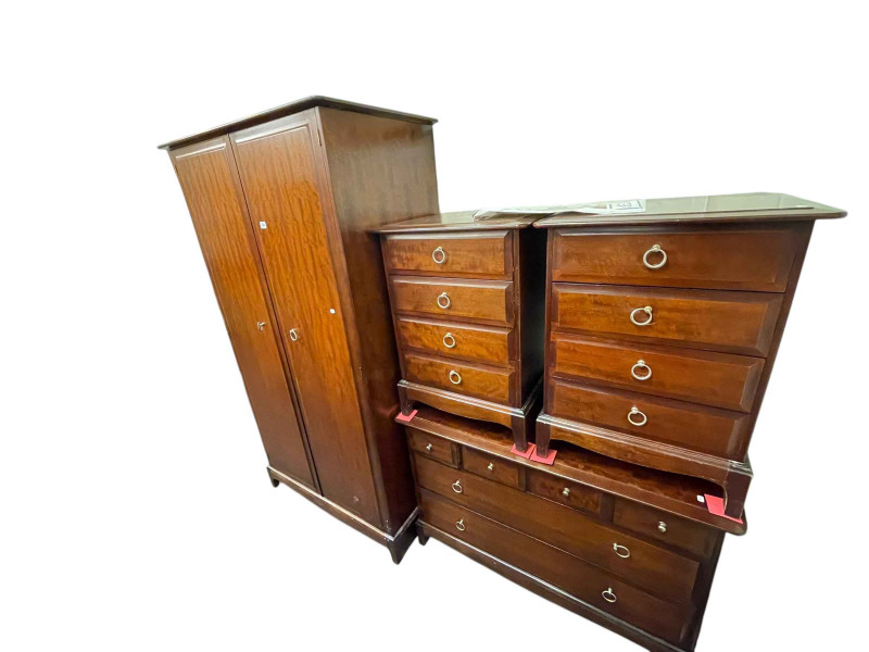 Six piece Stag Minstrel bedroom suite comprising two door wardrobe, triple mirror dressing table, dressing stool, six drawer chest and pair four drawer pedestal chests.