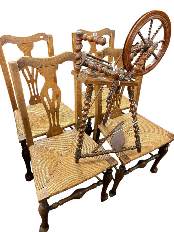 Set of four rush seated splat back dining chairs and twist leg spinning wheel.