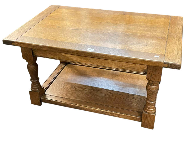 Rectangular oak coffee table on turned legs joined by undershelf, 46cm by 90cm by 60cm.