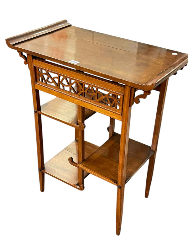 Oriental occasional table with fretwork frieze above three multi level shelves, 73cm by 62cm by 35cm.