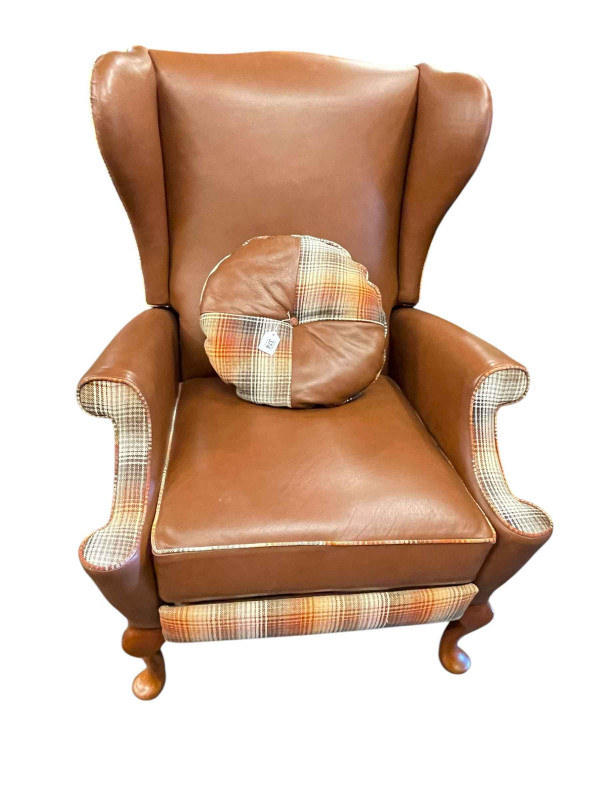 Parker Knoll wing back reclining chair re-upholstered in leather and tartan fabric.