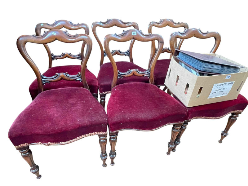 Set of six Victorian mahogany parlour chairs on turned legs with serpentine front seats.