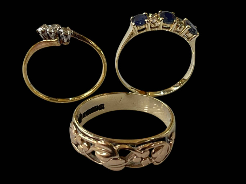 14k gold sapphire and diamond ring, 18ct three-stone diamond ring and 9ct gold ring (3).