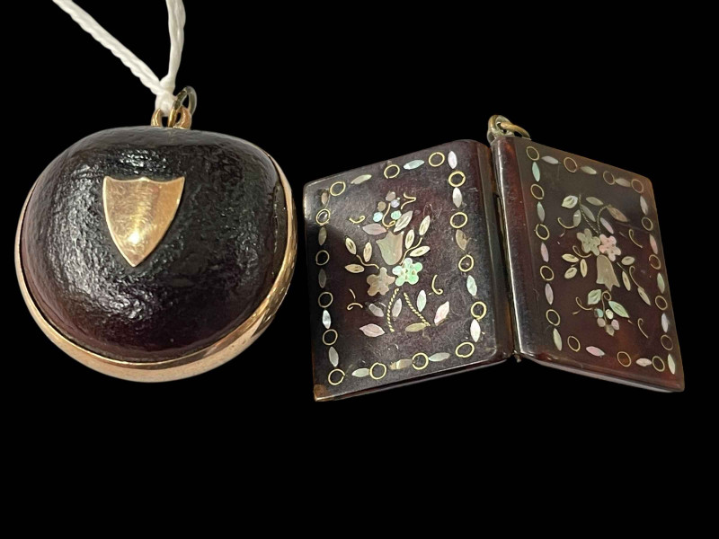 Gold mounted nut locket and pique hinged photo locket (2).