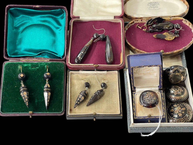 Collection of pique earrings, brooches and ring.