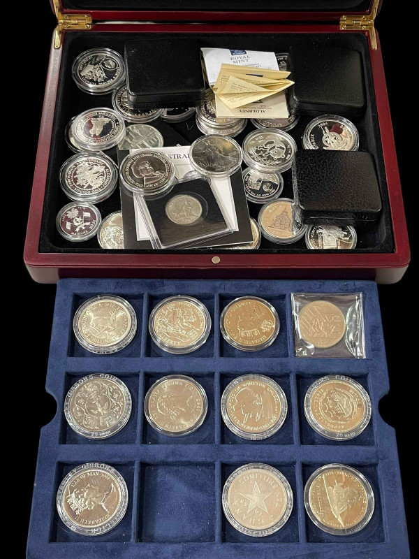 A very good collection of capsulated silver coins including Canadian dollars, Chinese Panda 1oz, US Liberty 1986 1 oz, Australia 1954 commemorative silver florin, 1984 Olympic dollar .999 silver proof, US Liberty silver one dollar, Space Exploration un-circulated proof etc.