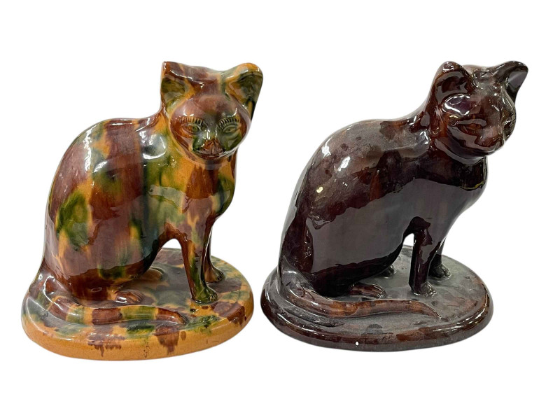 Two 19th Century 'Canny Hill' cats, 28cm.