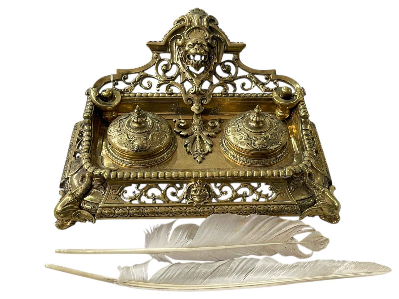 Highly ornate brass desk stand with inkwells, 32cm across.