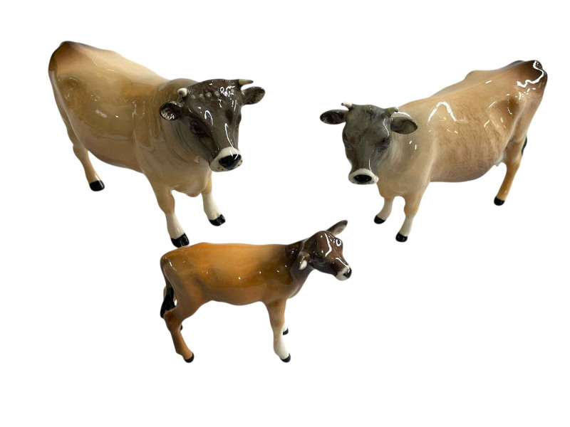 Beswick Jersey bull, cow and calf.