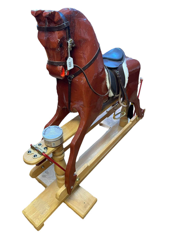 Bespoke painted wooden rocking horse on safety stand, made by Keith Edgar in 2015, 107cm x 135cm.