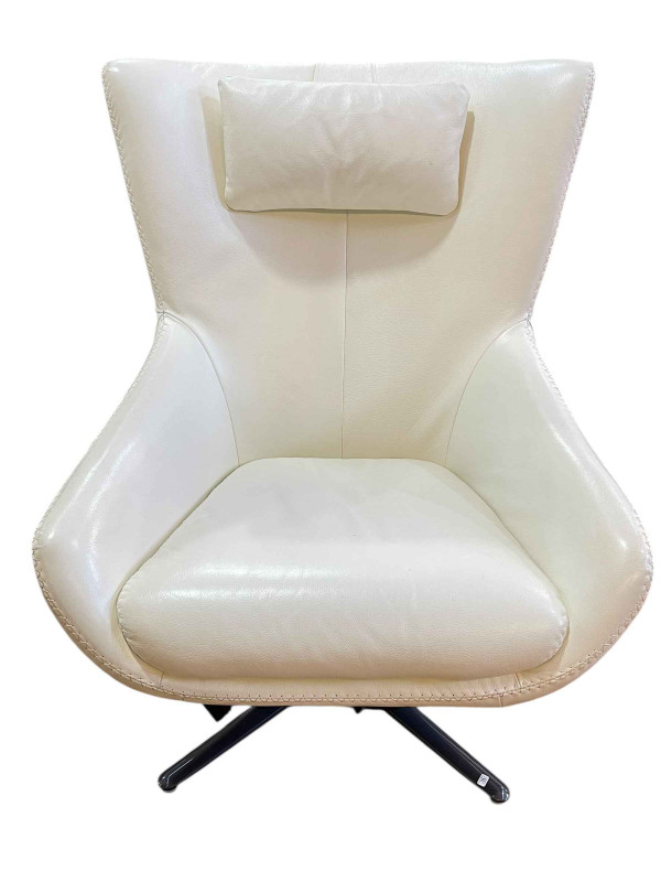 Contemporary white stitched leather swivel armchair.