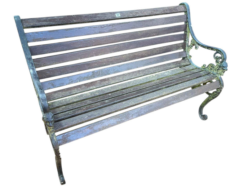 Weathered cast and wood slat garden bench, 82cm x 126cm x 66cm.