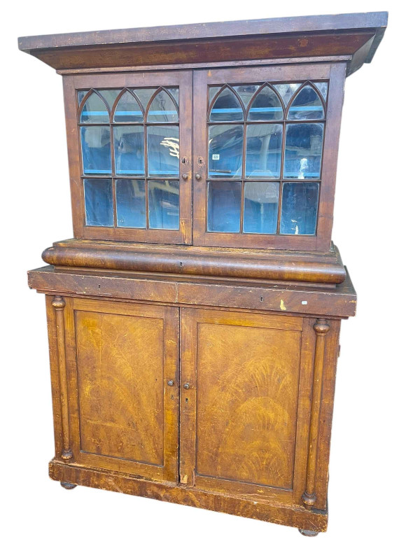 Antique country pine cabinet having two arched astragal glazed panel doors above three drawers and two cupboard doors, 225cm x 154cm x 69cm.