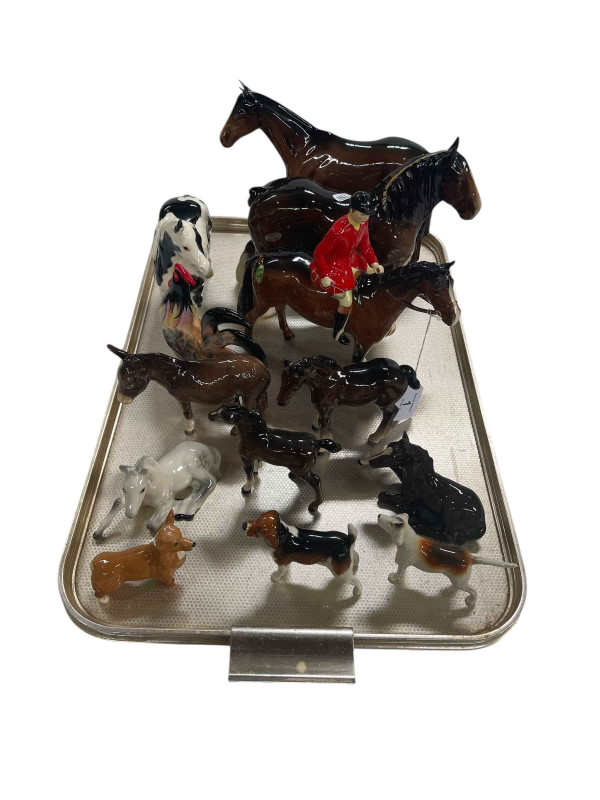 Collection of thirteen Beswick pieces including Huntsman, Piebald, Cockerel, etc.