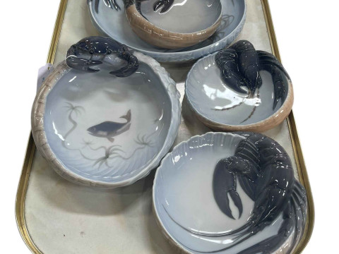 Five Royal Copenhagen lobster and crab dishes.