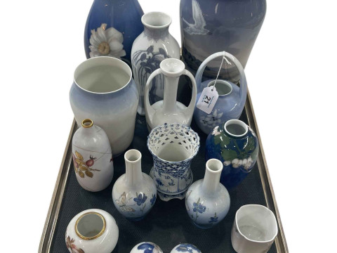 Eleven Royal Copenhagen vases, largest 25cm, and four small pieces.