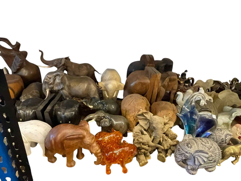 Large collection of elephants including Capo di Monte, Ann Richmond, Beswick, Royal Dux, coffee table, wooden sculptures, etc.