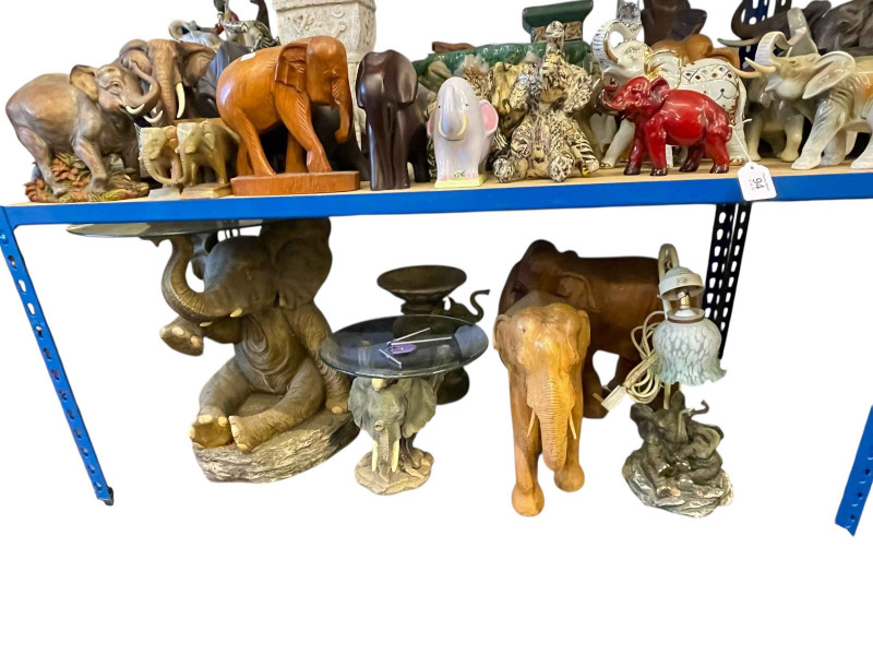 Large collection of elephants including Capo di Monte, Ann Richmond, Beswick, Royal Dux, coffee table, wooden sculptures, etc.