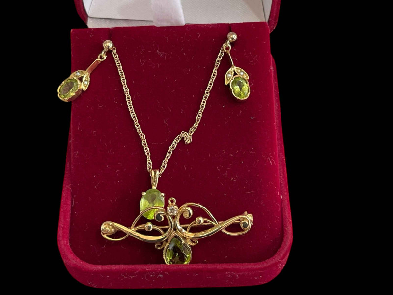 Peridot and diamond set 9 carat gold brooch, peridot and seed pearl earrings, and peridot pendant (3).