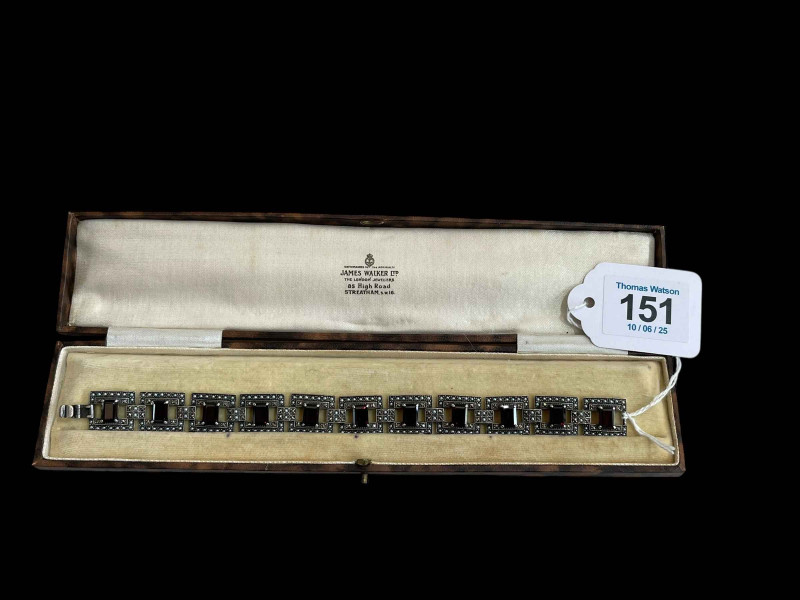 Art Deco silver bracelet set with garnets, seed pearls and marquisite, 18cm, boxed.