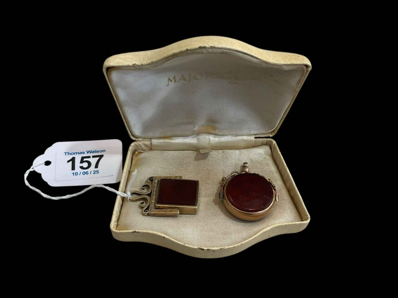 Two 19th Century gold hardstone swivel fobs.